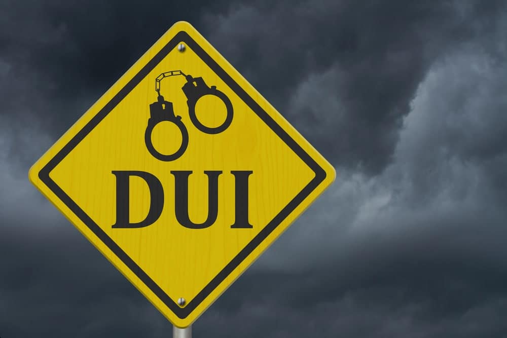 DUI warning road sign showing penalties under DUI license suspension in Florida