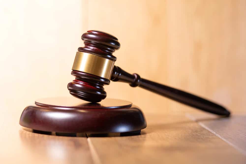 Image is of a judge's gavel representing court decisions on parenting time, concept of restricting visitation after DV in Cocoa Beach